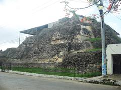 Archaeological ruins of Acanceh in Yucatán with ancient stone structures and greenery