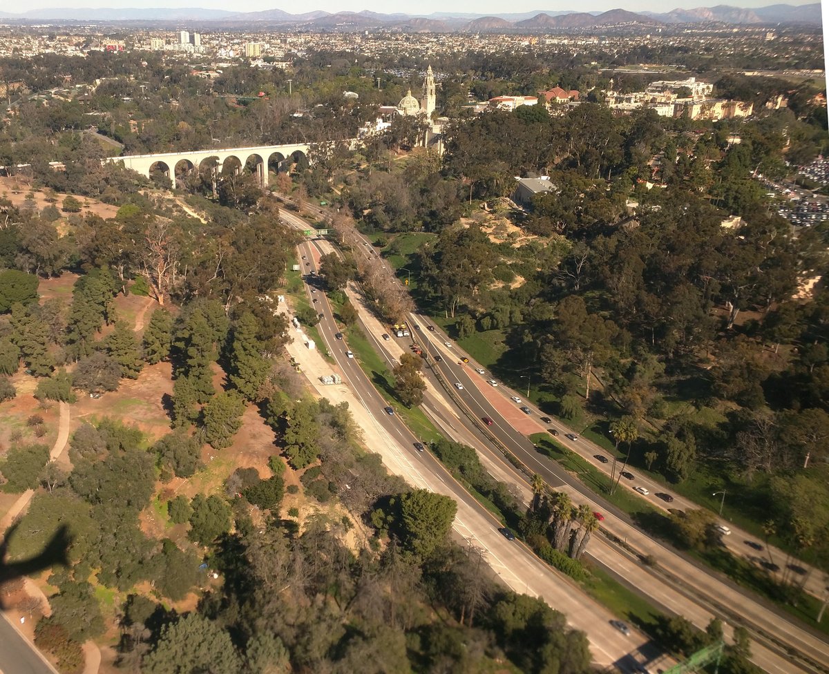 Highway 163 passing through Balboa Park with Cabrillo Bridge in San Diego