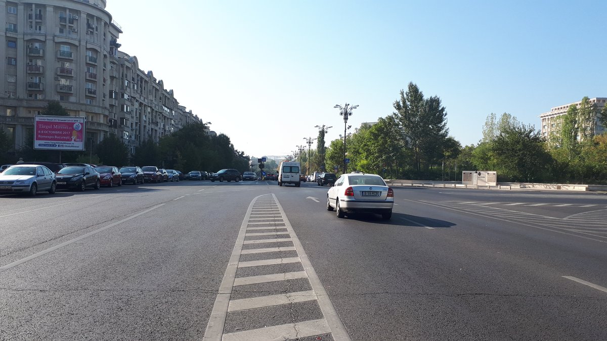 Constitution Square in Bucharest with modern buildings and traffic