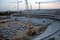 New National Stadium Lia Manoliu in Bucharest under construction with cranes and scaffolding