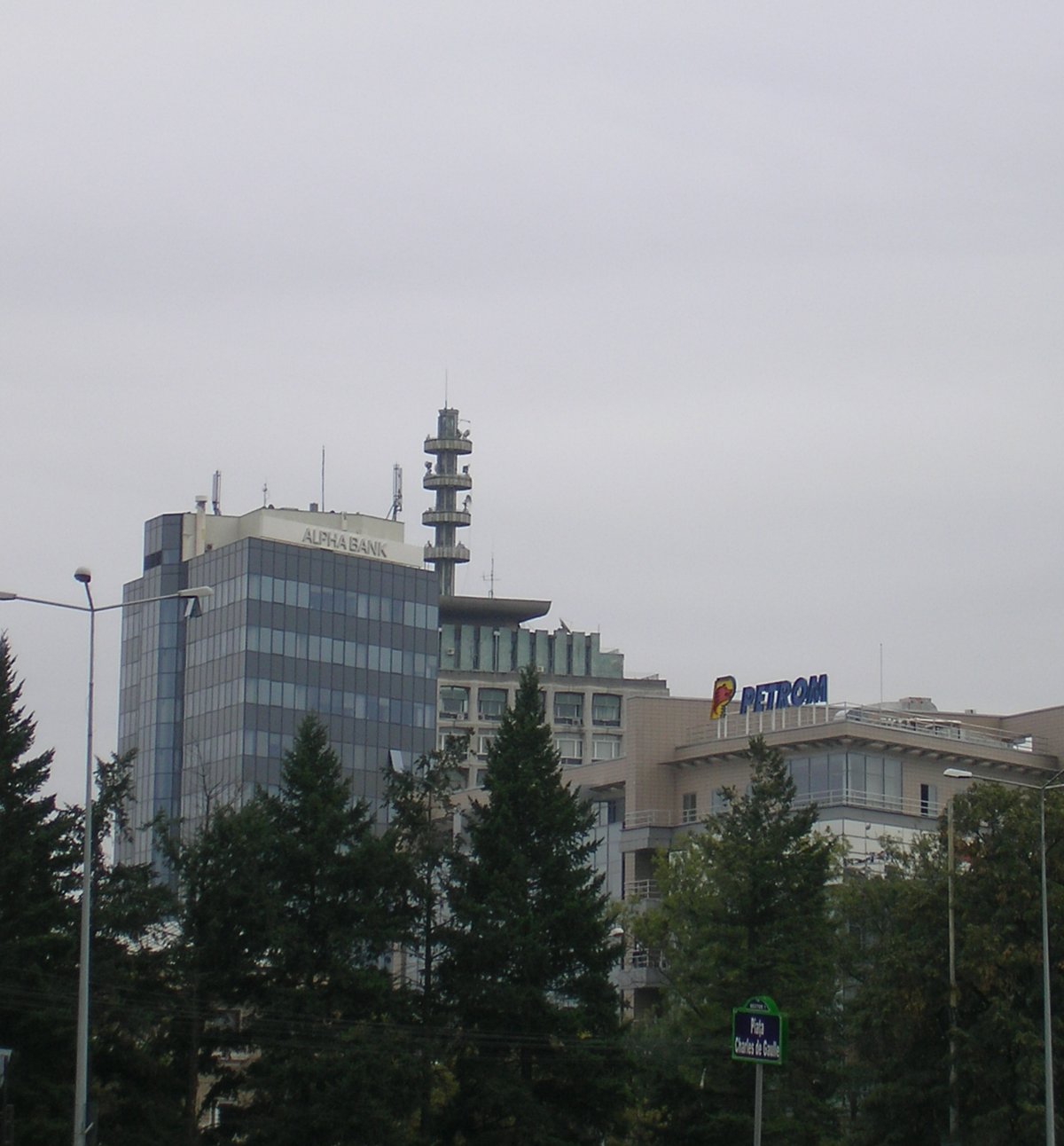 Alpha Bank and Petrom branches in Bucharest Charles de Gaulle Square with National Television building in background