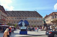 Place Gutenberg in Strasbourg with Renaissance Neubau building, Gutenberg statue and Alsace constellation statue