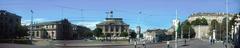 Panoramic view of Place Neuve in Geneva, Switzerland with historical buildings and clear blue sky
