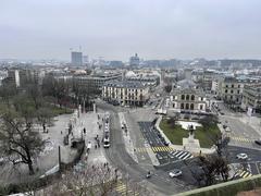View of Place Neuve from rue des Granges with historic buildings and street scene