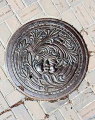 Drain cover with Olympic Plaza Calgary Olympic Bricks design