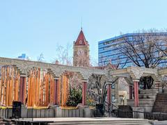 Olympic Plaza with City Hall Clock Tower and downtown Calgary during 1988 Winter Olympics
