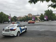 View of Place de France with police car in Yerevan