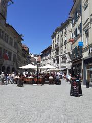 Place Palud in Lausanne with historical buildings and a tower