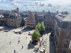 View of Cathédrale Notre-Dame de Strasbourg with a statue in front during daytime