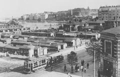 View of Hakaniementori Square in Helsinki in 1913 with market stalls and people