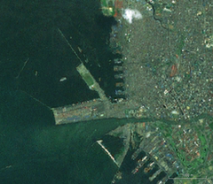 Landsat satellite view of Manila International Container Terminal showing detailed port infrastructure and water bodies