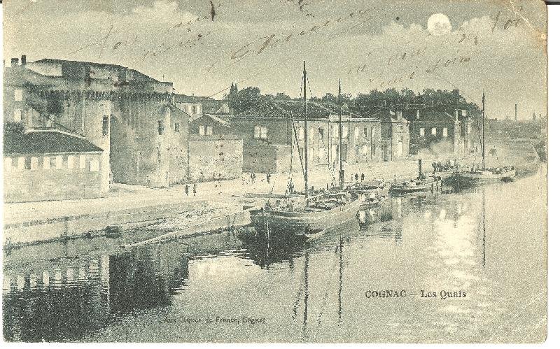 Historic gabarres boats docked at the port of Cognac on the river
