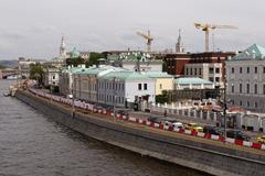 Rebuilt Sofiyskaya Embankment waterfront buildings with Kremlin in background, Moscow, May 2021