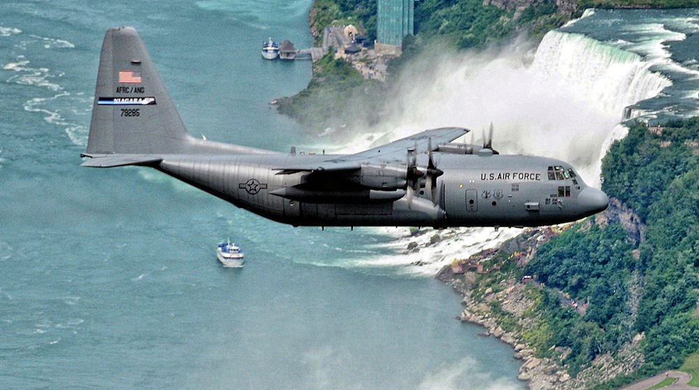C-130 Hercules aircraft flying over Niagara Falls