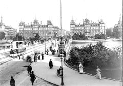Dronning Louises Bridge in Copenhagen with people walking and city buildings in the background