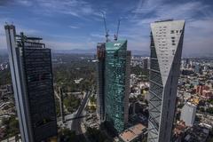 Aerial view of Mexico City skyline during sunset