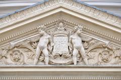 Pediment detail of the Théâtre du Rond-Point in Paris France showing classical architectural features