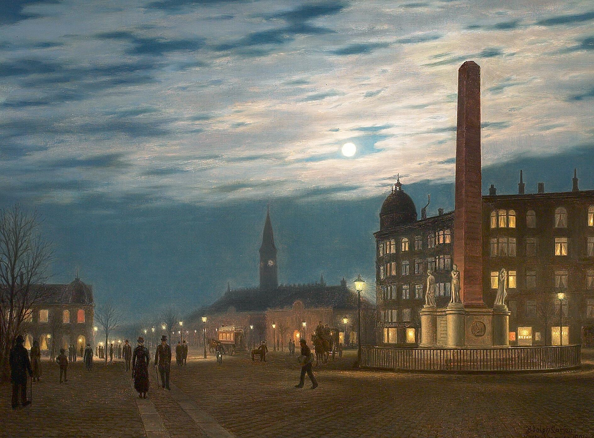 Vintage evening scene on Vesterbrogade with illuminated Frihedsstøtten monument, Copenhagen 1901