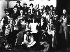 Group photo of Hypocrites' Club members dressed in formal attire