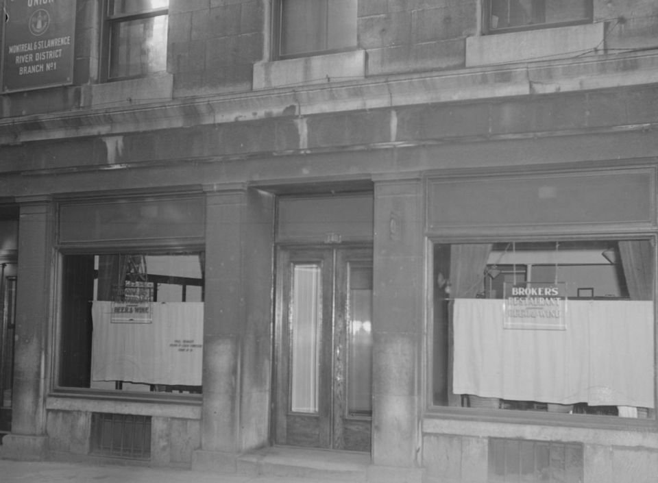 Exterior view of Broker's Cafe on Rue Saint-François-Xavier in Montreal