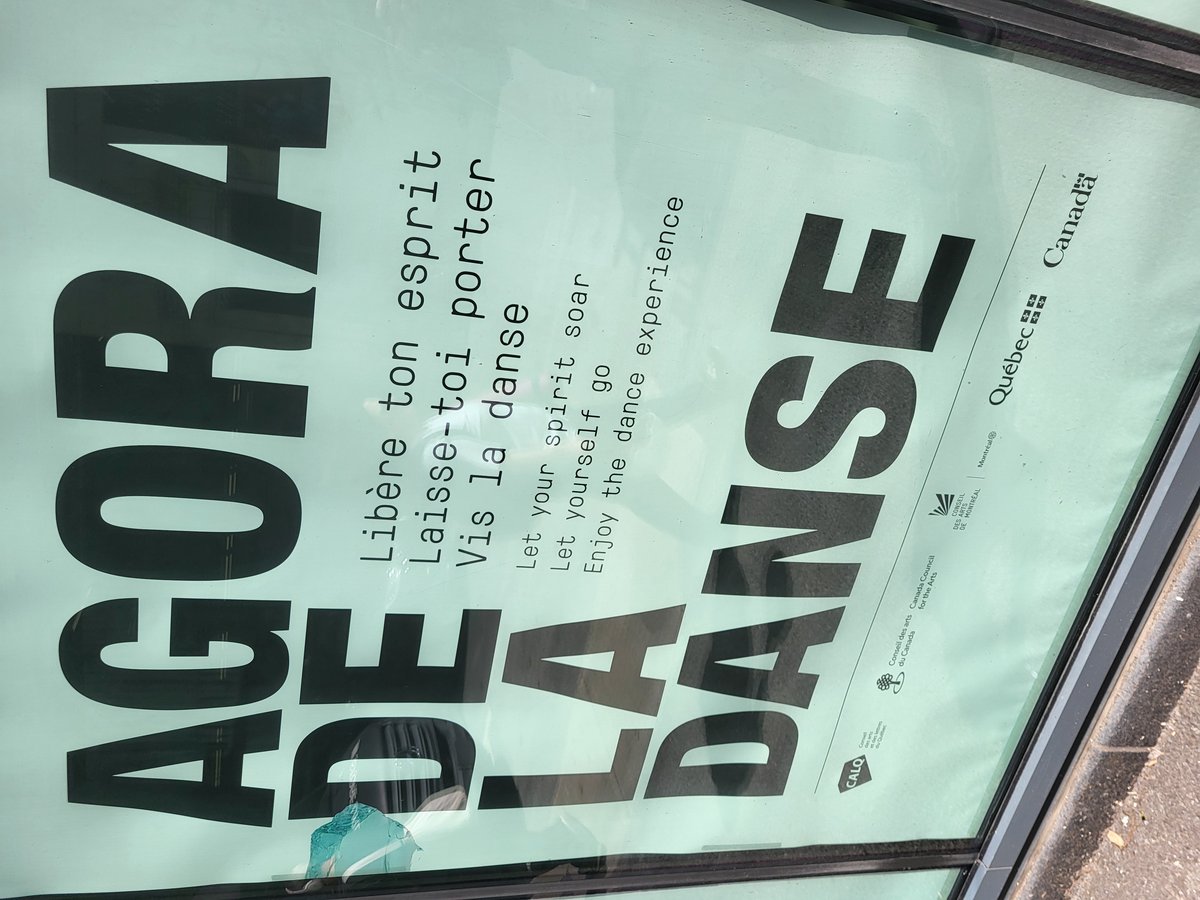 Sign for Agora de la danse in window on rue De Bleury