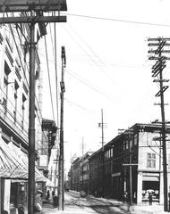 Rue Notre-Dame street view eastwards from Rue Bonsecours with Alexandre-Maurice-Delisle warehouse