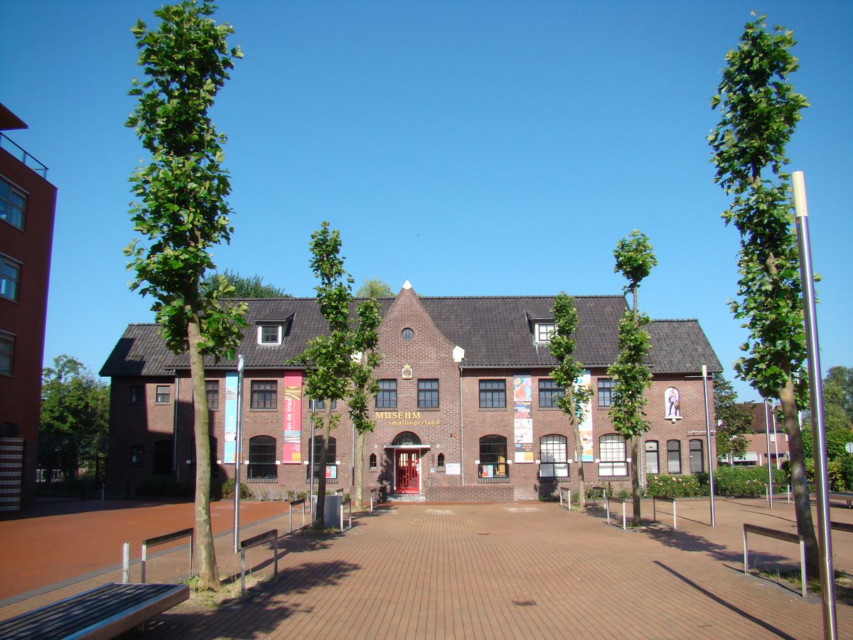 Scenic view of Drachten city in the Netherlands with modern buildings and greenery