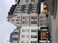Exterior view of Les Bons Enfants brasserie at Place du Grand Sablon 49 in Brussels