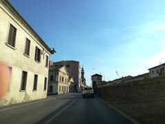 Scenic view of Battaglia Terme town with historic buildings and a canal