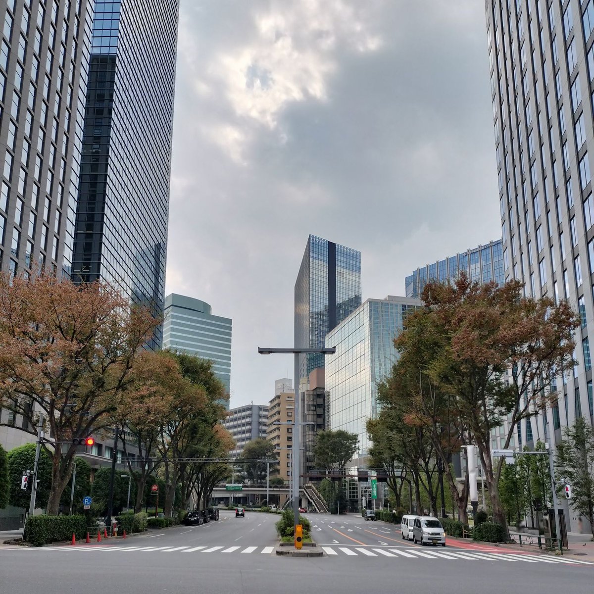 Northern end of Koen Street in Nishi-Shinjuku, Shinjuku Ward, Tokyo with Ome Kaido street in front, Shinjuku Oak City buildings on the west and Central Park Tower La Tour Shinjuku in the background