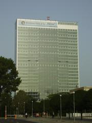 Tower 115 in Bratislava cityscape during sunset