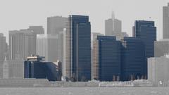 Hyatt Regency hotel and four towers of Embarcadero Center highlighted in San Francisco