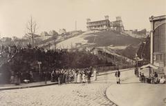 Construction of Sacré-Cœur Basilica in 1882 with Saint-Pierre square and Montmartre market
