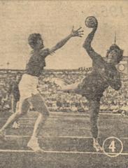 Antoaneta Oțelea playing handball in a match between Romania and Denmark