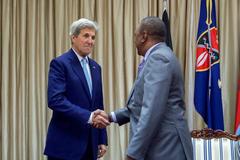 U.S. Secretary of State John Kerry shaking hands with Kenyan President Uhuru Kenyatta at State House Nairobi