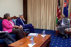 U.S. Secretary of State John Kerry and Assistant Secretary Linda Thomas Greenfield listening to Kenyan President Uhuru Kenyatta speaking at State House Nairobi