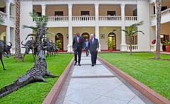 U.S. Secretary of State Rex Tillerson walking with Kenyan President Uhuru Kenyatta on the State House lawn in Nairobi Kenya