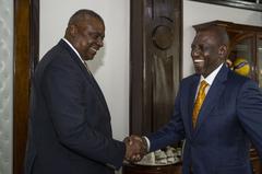 Secretary of Defense Lloyd Austin greeting Kenya President William Ruto at Kenya State House in Nairobi on September 25, 2023