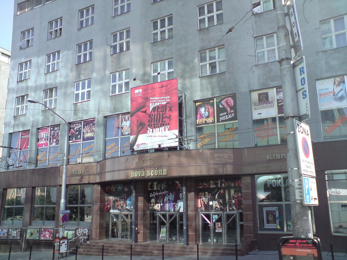 Divadlo Nová scéna theater building in Bratislava illuminated at dusk