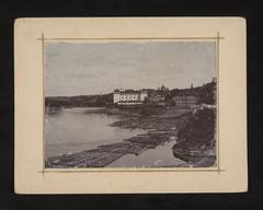 Historical view of Vilnia city with Vialla river and Antokal area featuring Slushka palace in 1905