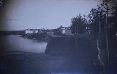 Vilnia River and Vialla River near Antokal with Slushkas Palace in the background, historical photo from 1915-18