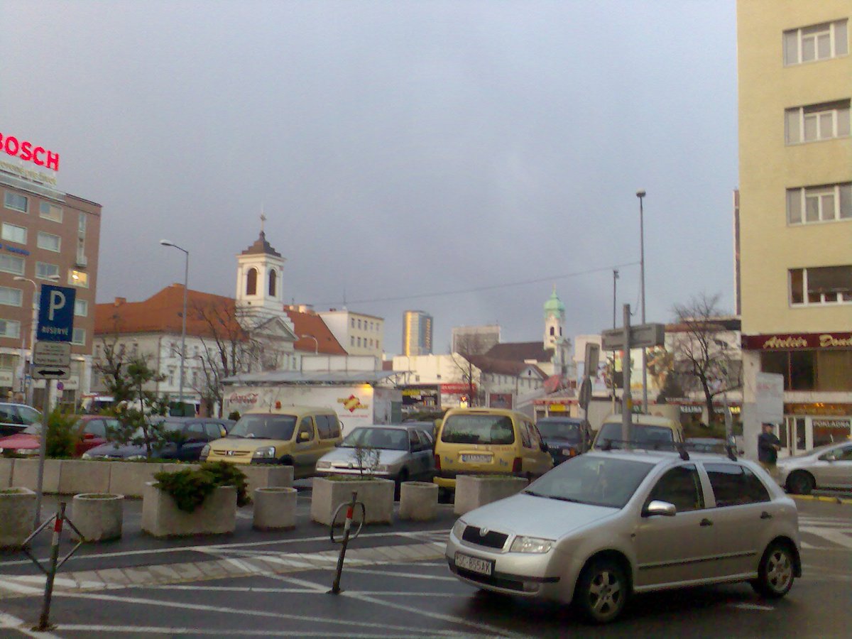 View of Kamenné námestie in Bratislava with historic buildings and shops