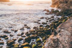 Large boulders at Sutro Baths ruins on the coast of San Francisco