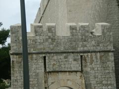 Fortress above the east entrance gate of Dubrovnik old town with historic stone walls