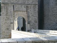 East city gate of the old town in Dubrovnik with historic stone walls and red-tiled roofs