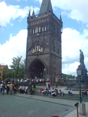 George Bridge Entrance in Prague, Czech Republic with historic architecture and stone statues