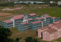 Hostels of IIT Guwahati campus with multi-storey buildings and greenery