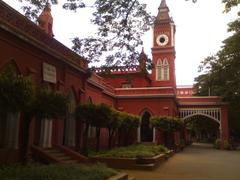 Scenic view of Bangalore University campus with historic buildings and greenery
