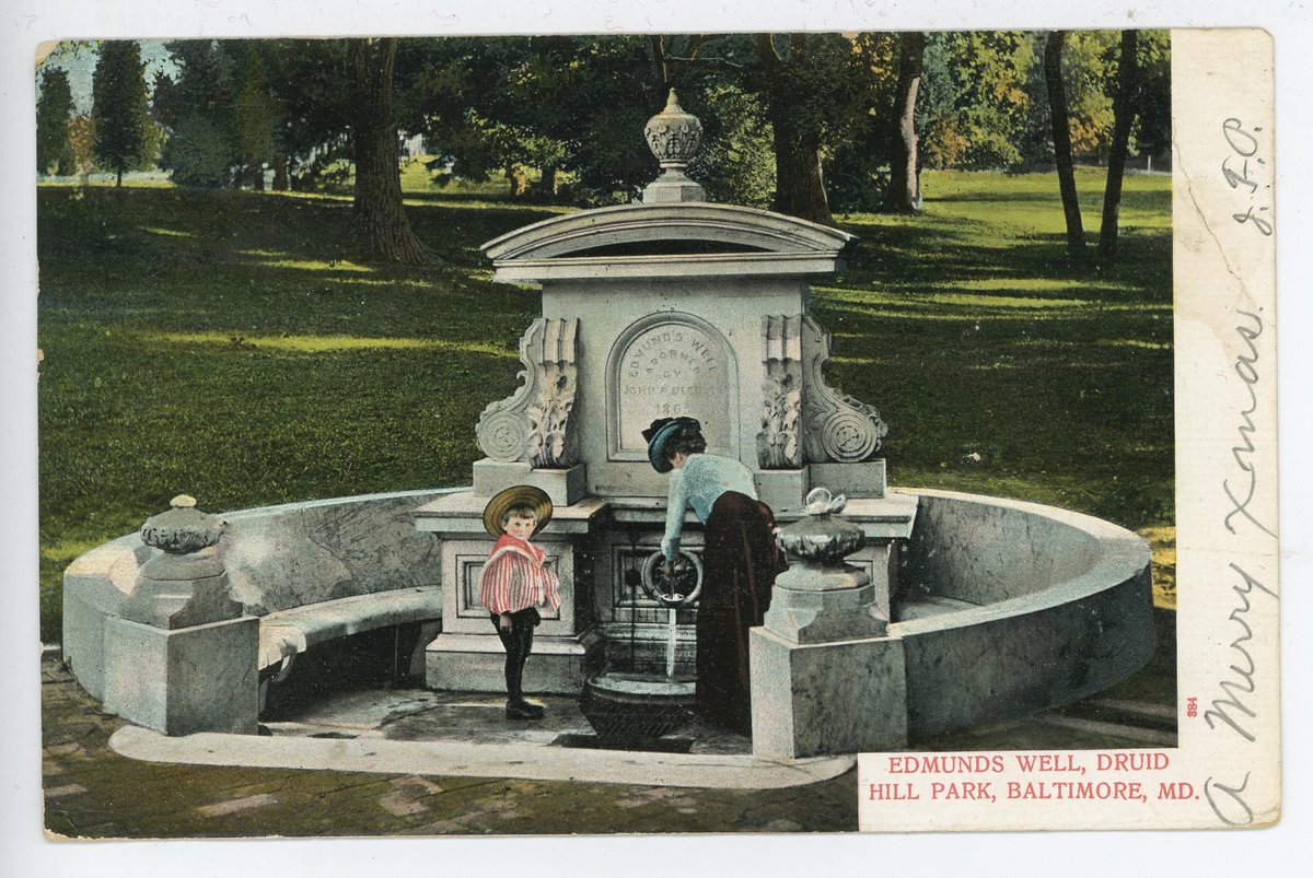 Woman and boy at Edmunds Well in Druid Hill Park Baltimore 1907