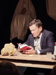 Sylvain Tesson speaking at Théâtre de Poche-Montparnasse in December 2024